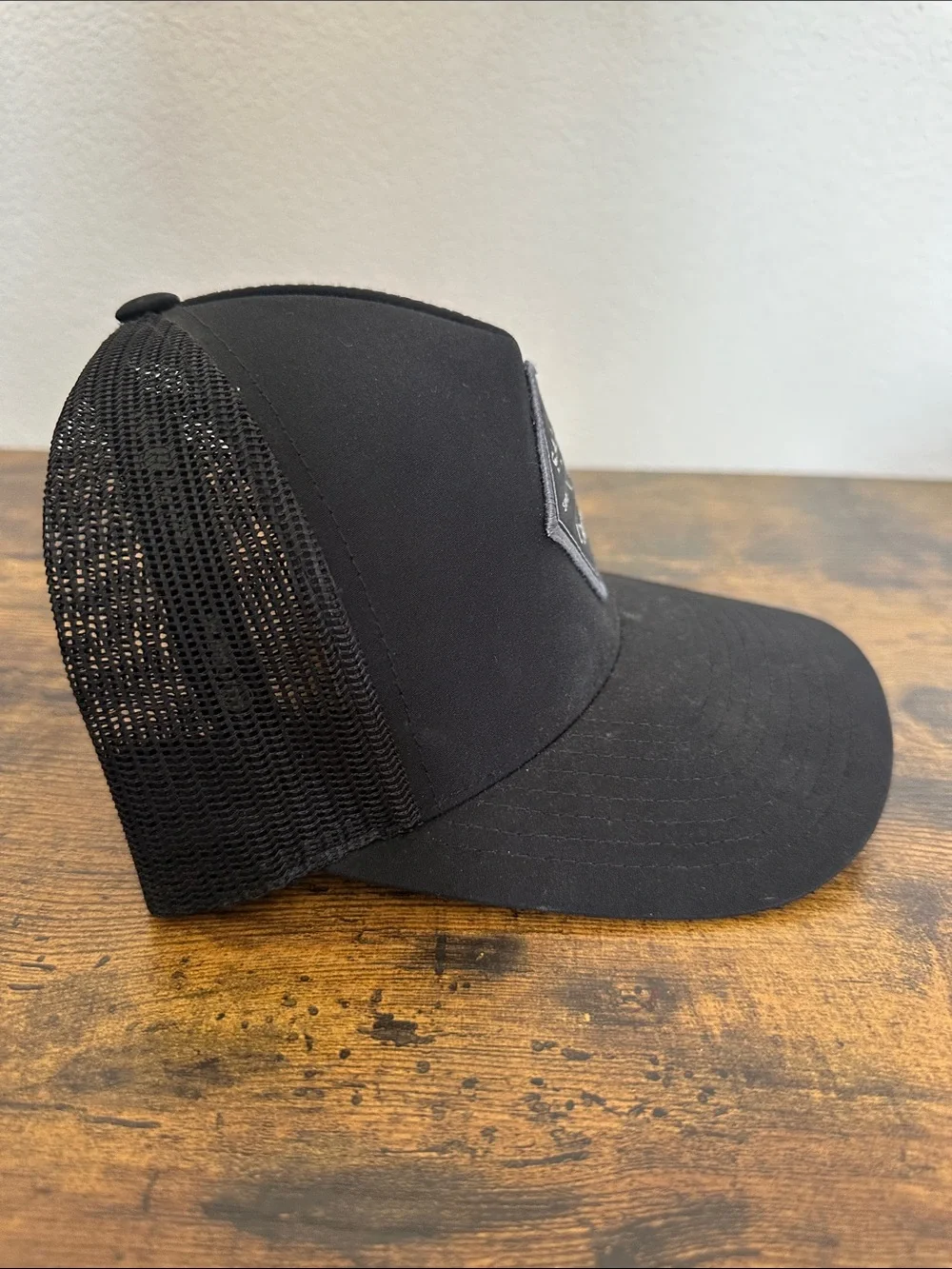 Salty Crew Black Trucker Hat with Gray Diamond Patch